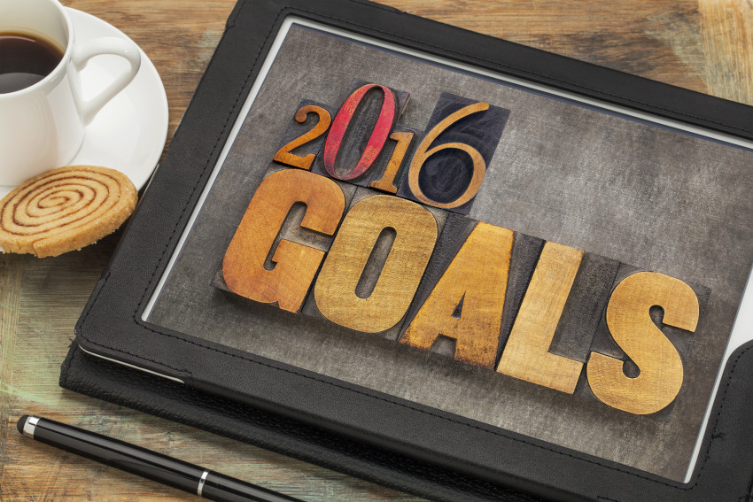 Text on Tablet: "2016 Goals"