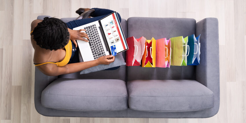 African American Shopping Online On Ecommerce Website Using Laptop