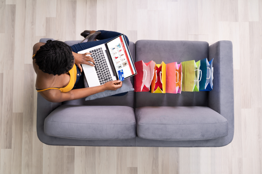 African American Shopping Online On Ecommerce Website Using Laptop