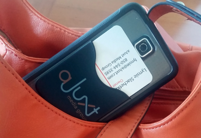 Example of a promotional product (SWAG): a pocket that adheres to a cellphone that can hold cards or money