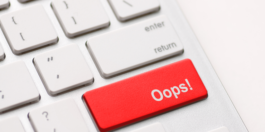 Keyboard with a red button labeled "Oops" instead of the right shift