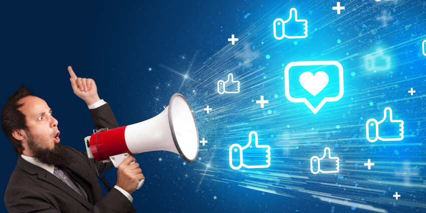 Young person yellin in loudspeaker with speech bubble with a heart icon, social networking concept