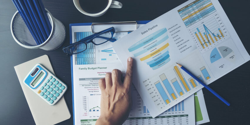 Excel Spreadsheet Stats Graph Analytics Data. Accountant Hands