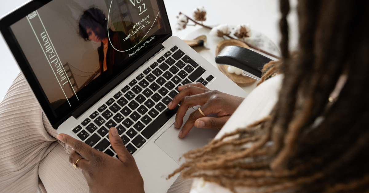An African American business woman works on a laptop computer